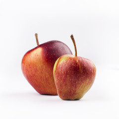 two textured red apples isolated on white