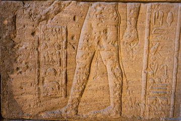 Real Hieroglyphic carvings on the walls of an ancient egyptian temple