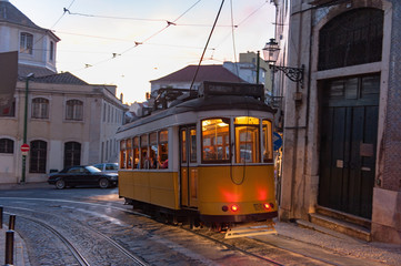 Tram on street at evening in Lisbon, Portugal