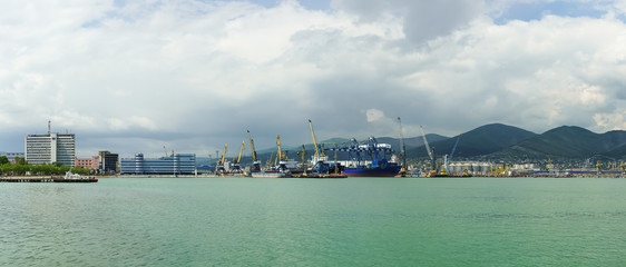 NOVOROSSIYSK, RUSSIA - MAY 08.2016:Panorama of Novorossiysk commercial sea port mountains in the background