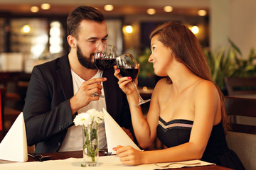 Romantic couple dating in restaurant