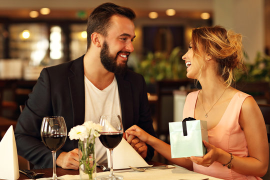 Romantic couple dating in restaurant