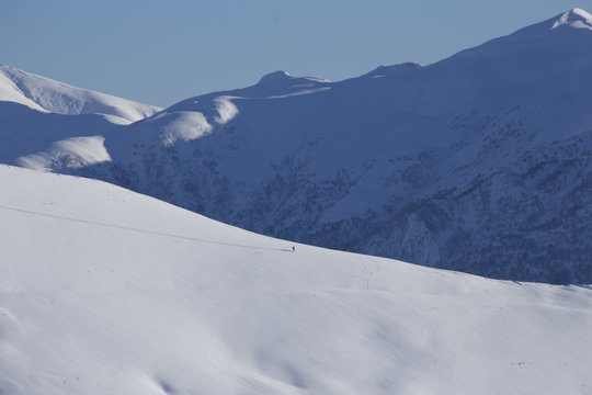 Mountain landscape panorama with mountain-skier