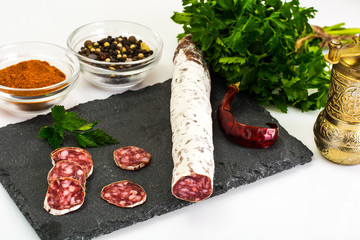 Snack smoked jerky sausage with spices, garlic and parsley