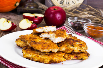 Grilled chicken schnitzel with apple