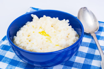 Rice pudding in a blue bowl