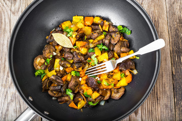 Vegetable stew with pumpkin, celery and mushrooms