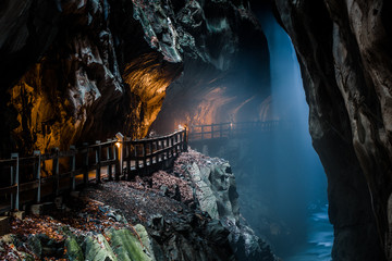 Passage with mist coming from Tamina spring