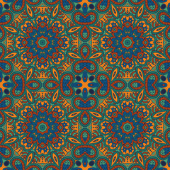 Seamless pattern doodle ornament. Colorful background. Ethnic motives. Zentangl. Orange, green and blue