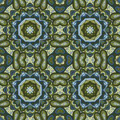 Seamless ornament. Colorful background. Ethnic motives. Zentagl. Green and blue