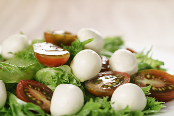 salad with kumato tomato, mozzarella and frillies lettuce