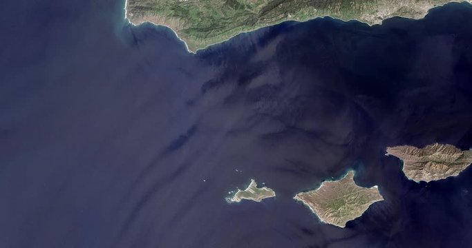 High-altitude overflight aerial of the California coast off Santa Barbara. Clip loops and is reversible. Elements of this image furnished by NASA 