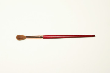 Artist paint brush on white