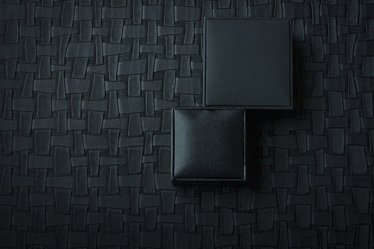 Male gift boxes on black leather background