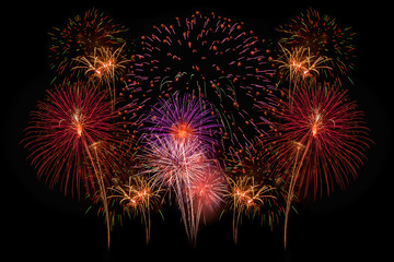 Colorful fireworks on the black sky background.