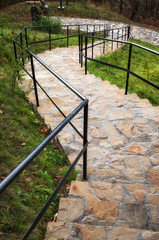 Stone stairs with a wrought-iron fence