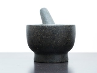 Granite mortar standing on kitchen table