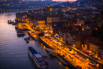 Night top view of the Douro river and Ribeiro at Porto, Portugal.
