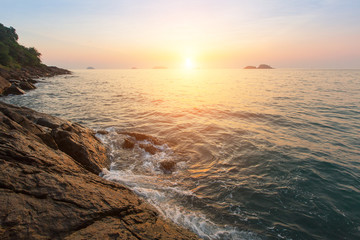 Fototapeta premium Rocky seashore at sunset.