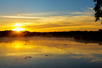 Misty morning on a small lake