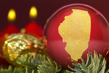 Red bauble with the golden shape of Illinois.(series)