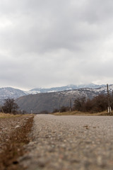 road on a background of mountains