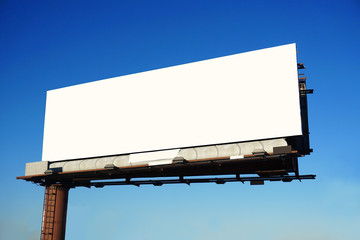 blank advertisement board outdoor against blue sky ready for text