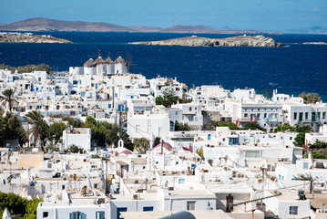 Fototapeta premium View over Mykonos town at noon including the famous windmills