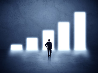 Obraz premium man standing in front of a chart