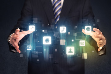 Businessman holding blue applications