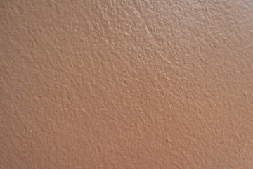 Surface of dark orange background