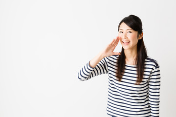 Fototapeta premium portrait of young asian woman calling isolated on white background