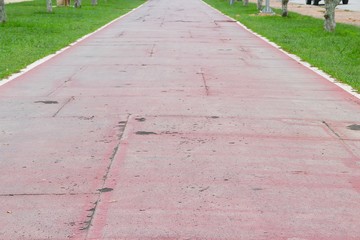 Obraz premium Running track old rubber coating shabby and cracked surface