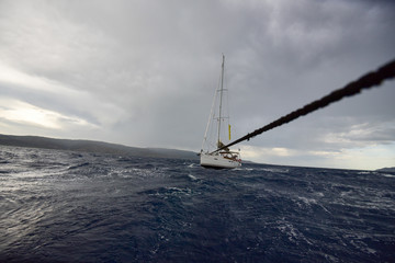Towing a sailing yacht