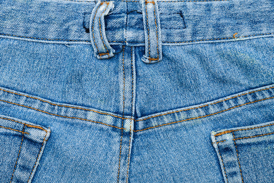 Close up image of blue denim jeans background or texture.