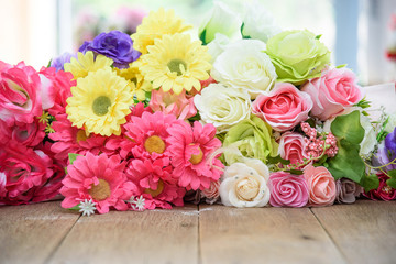 flowers on wooden background