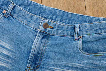 Close up image of blue denim jeans background or texture.