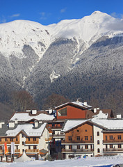 Fototapeta na wymiar hotel village at the ski resort, snowy Caucasian Mountains