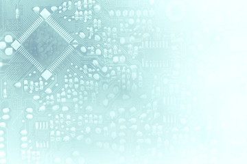 pcb board integrated circuit pc parts motherboard chip processor texture backdrop. toned into light blue tones, faded into white at the side. suitable as a background for your business presentation.