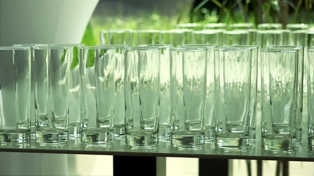 several empty glasses on the table in restaurant
