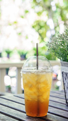 ice fruit tea on a wooden table.