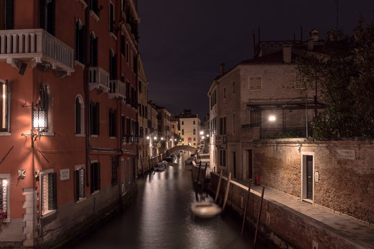 Venice - channel with little bridge at night