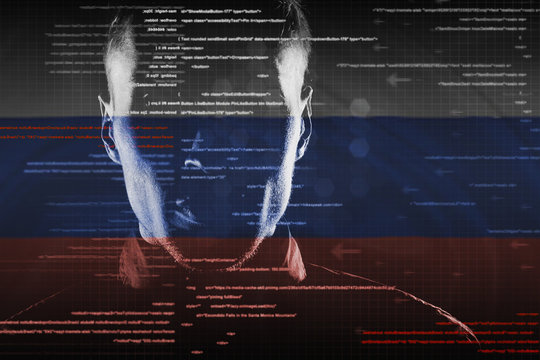 hacker at work with graphic user interface around with russian flag on background