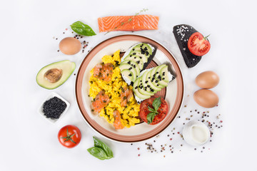 scrambled egg with salmon fish, bruschetta with avocado