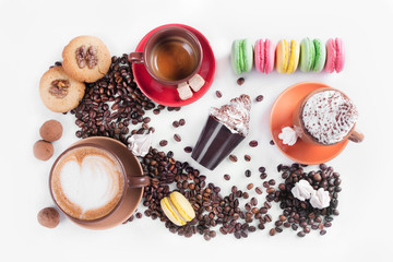 Obraz na płótnie Canvas coffee cup with color dessert macaroon, tiramisu cake