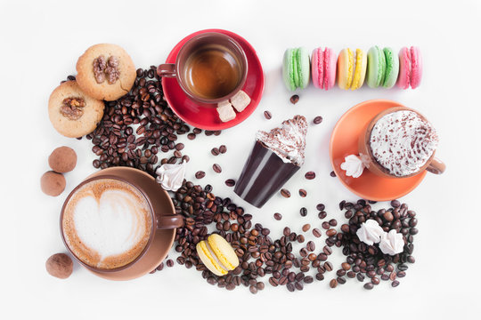 coffee cup with color dessert macaroon, tiramisu cake