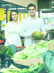 Fototapeta premium Couple buying vegetables