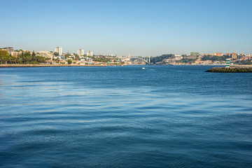 Obraz premium Douro river mouth near Porto, Portugal ocean sea city