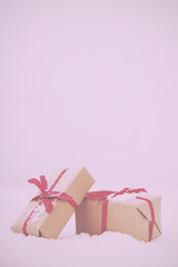 Christmas presents in brown paper with red ribbon Vintage Retro