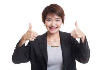 Young Asian business woman show two thumbs up.